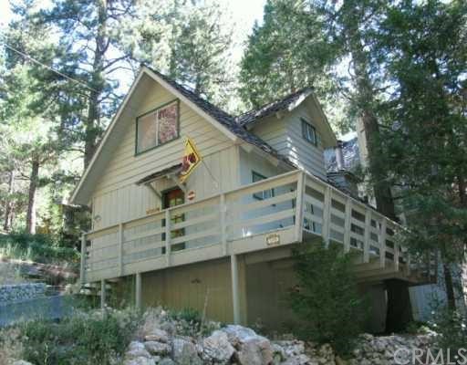 395 Castle Gate Road Lake Arrowhead, CA 92352 - Photo 1 of 1 a view of a house with a yard