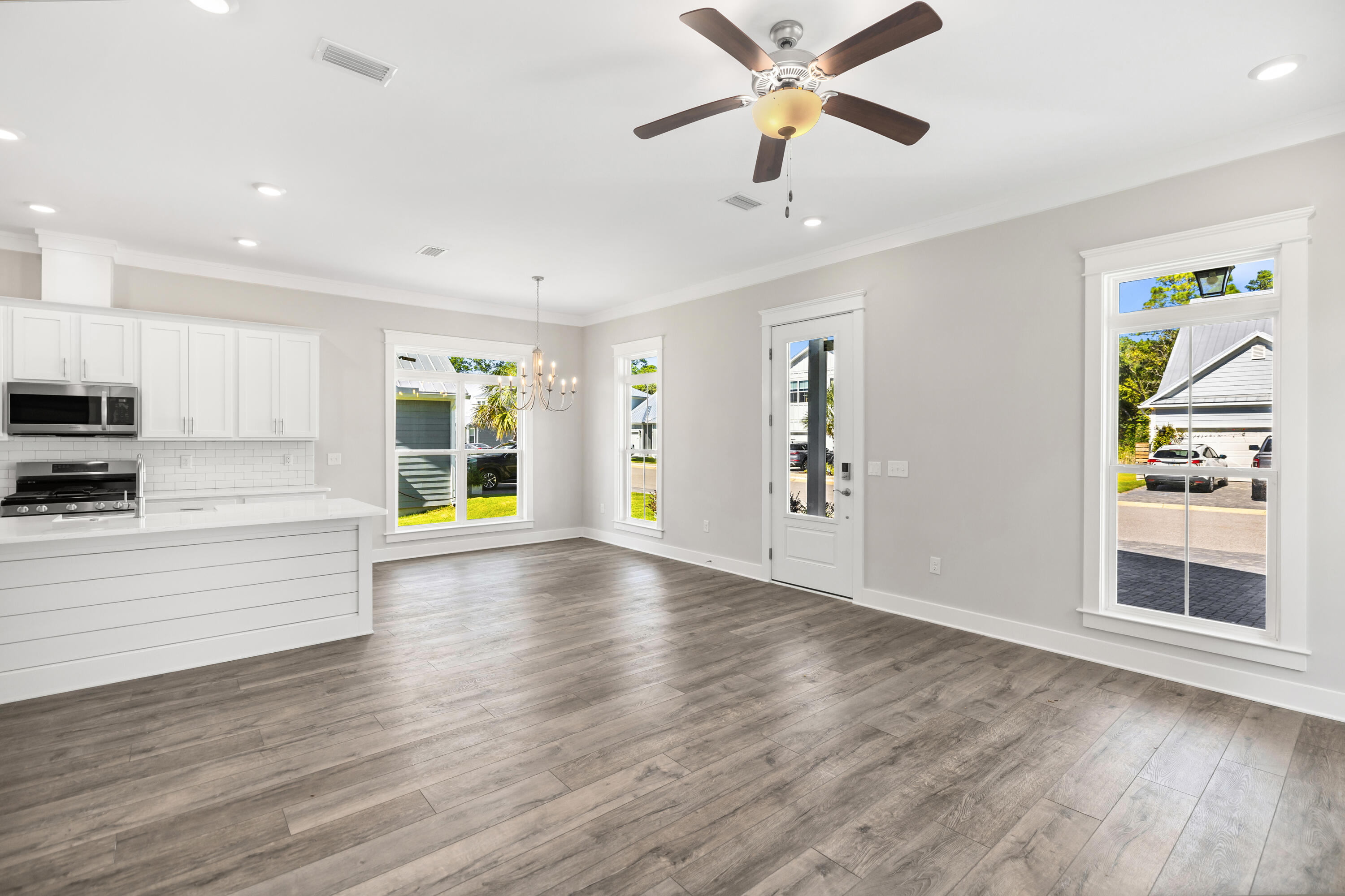 76 Bayou Edge Landing Santa Rosa Beach, FL 32459 - Photo 11 of 49 a view of an empty room with window and wooden floor