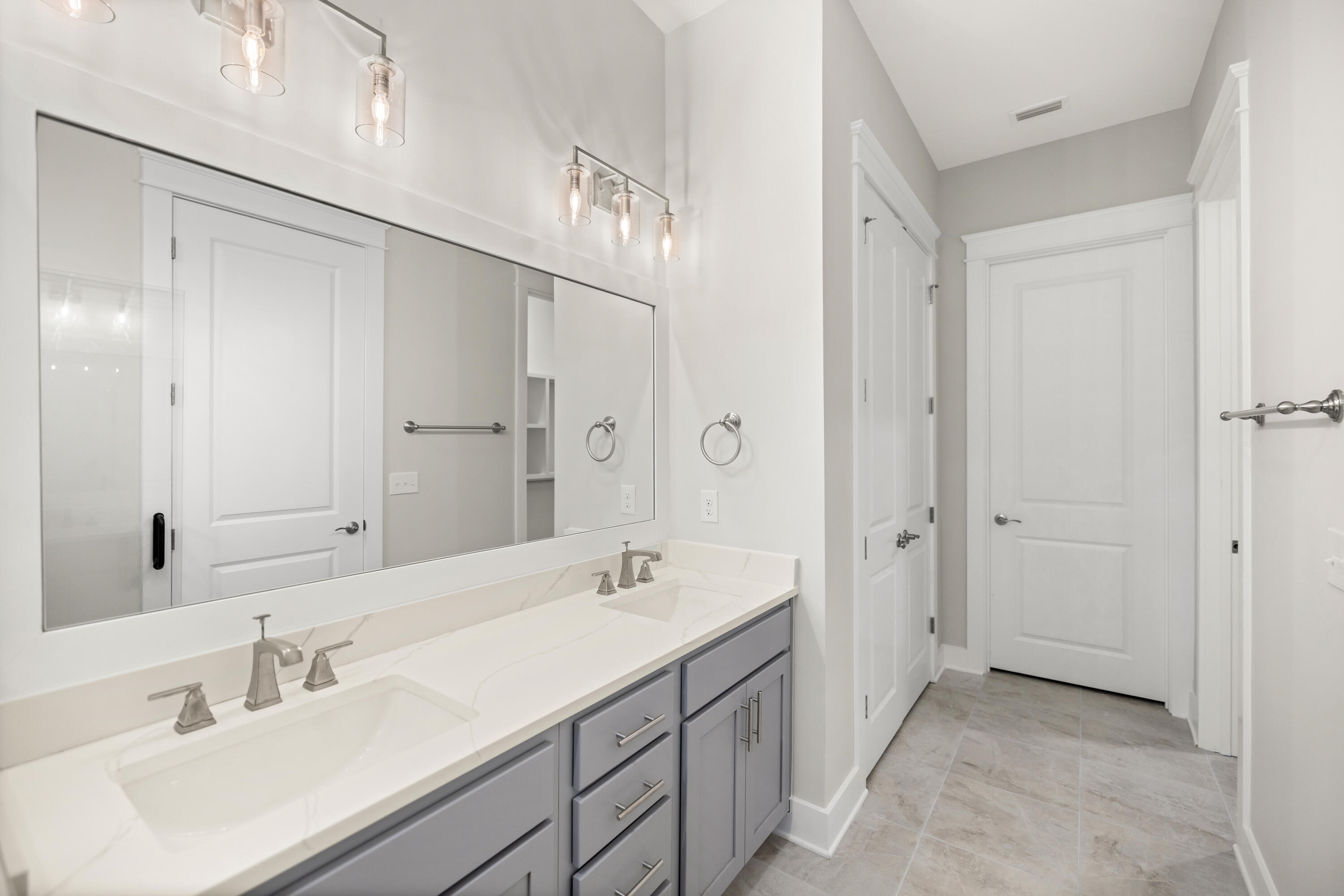 76 Bayou Edge Landing Santa Rosa Beach, FL 32459 - Photo 25 of 49 a spacious bathroom with a double vanity sink mirror and double