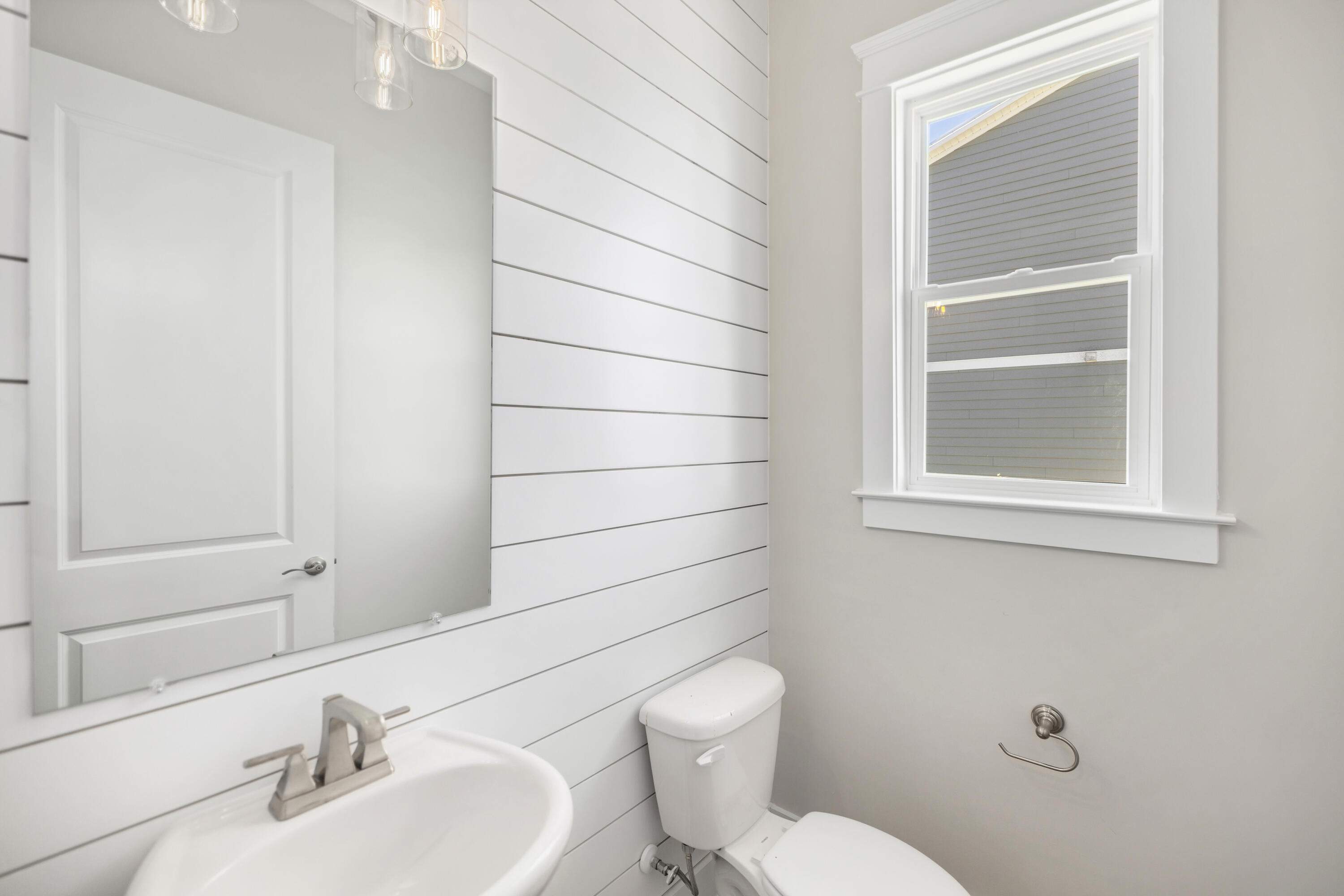 76 Bayou Edge Landing Santa Rosa Beach, FL 32459 - Photo 42 of 49 a bathroom with a sink mirror and toilet