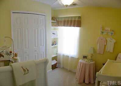 4802 Tapestry Terrace Durham, NC 27713 - Photo 4 of 12 a bathroom with a sink and a mirror