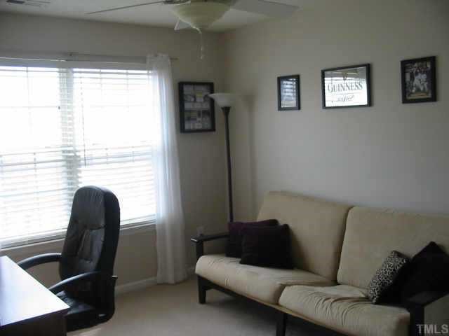 4802 Tapestry Terrace Durham, NC 27713 - Photo 10 of 12 a living room with furniture and a window
