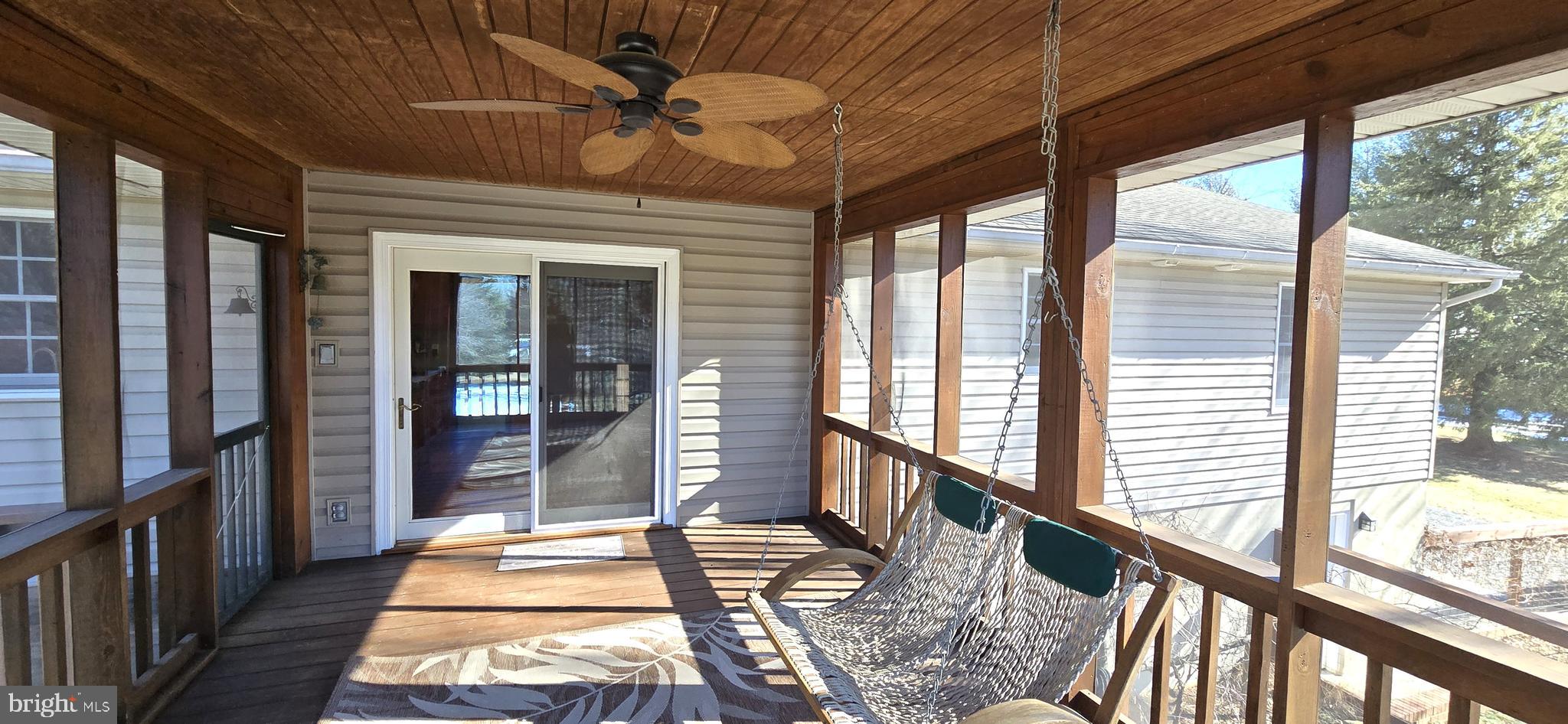 515 Windy Ridge Road Front Royal, VA 22630 - Photo 25 of 56 Screened Porch With Doors To Kitchen