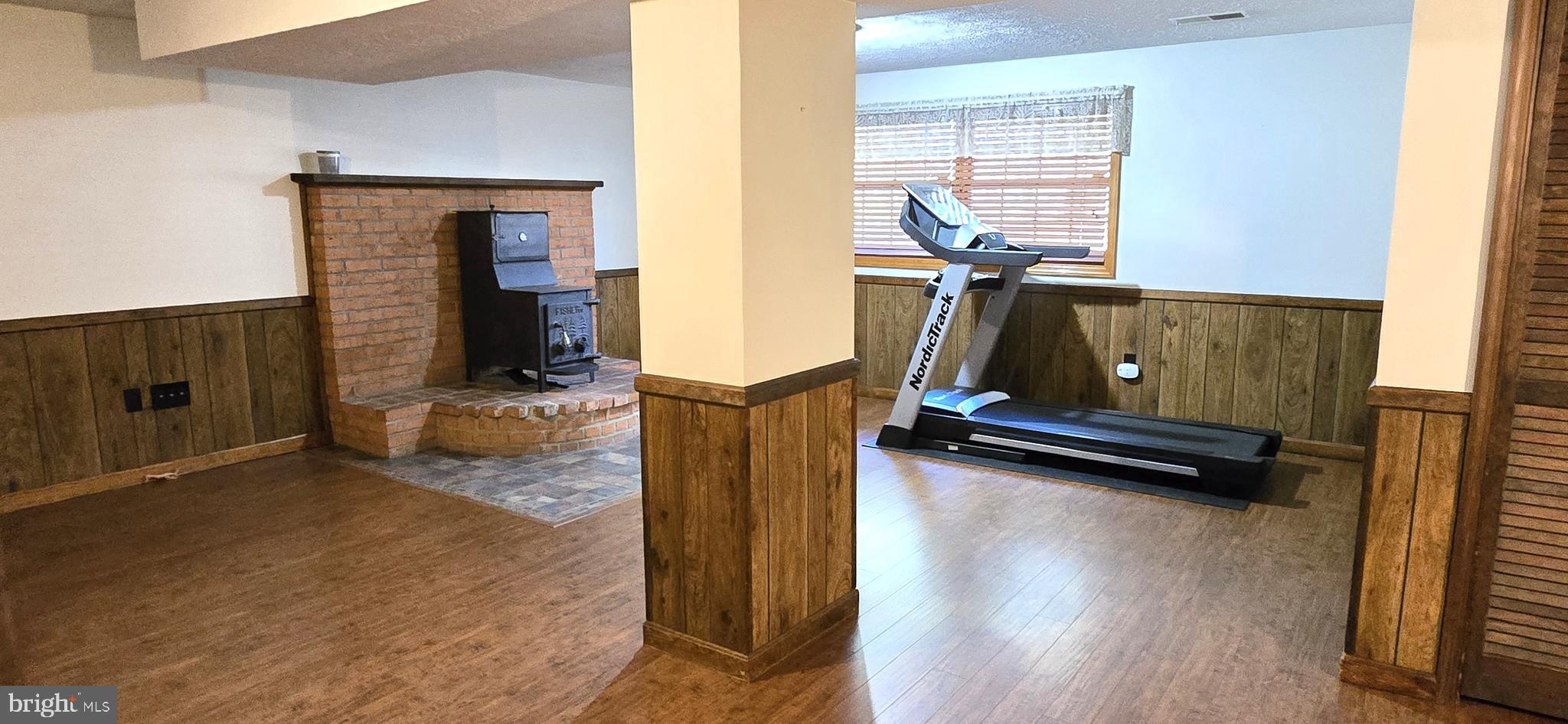 515 Windy Ridge Road Front Royal, VA 22630 - Photo 27 of 56 Lower Level Family Room With Wood Stove
