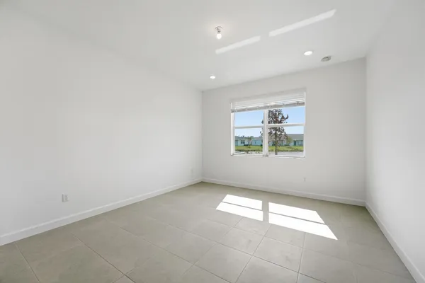an empty room with windows