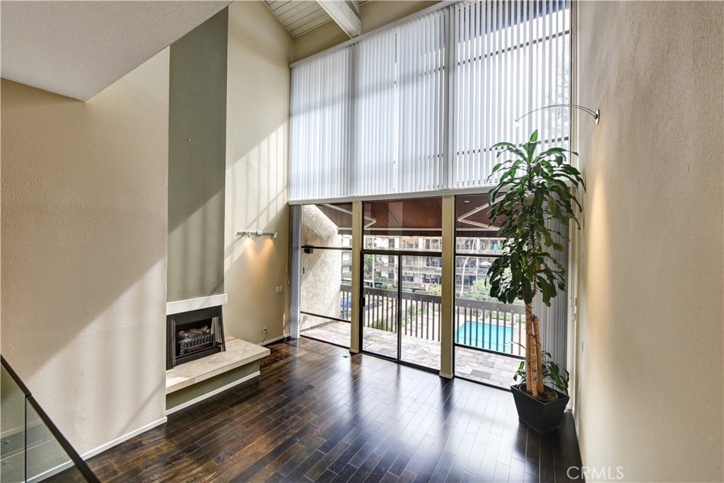 a view of entryway with wooden floor