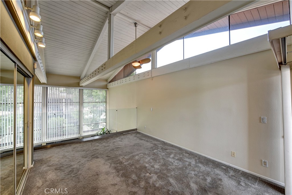 6316 Marina Pacifica Drive North Long Beach, CA 90803 - Photo 16 of 21 a view of an empty room with windows