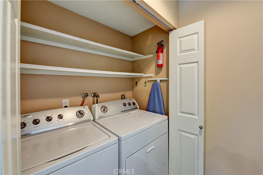 6316 Marina Pacifica Drive North Long Beach, CA 90803 - Photo 17 of 21 a utility room with dryer and washer