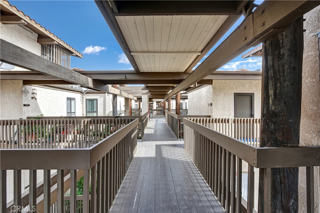 6316 Marina Pacifica Drive North Long Beach, CA 90803 - Photo 20 of 21 a view of staircase with railing and stairs
