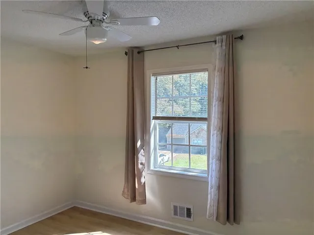 an empty room with windows