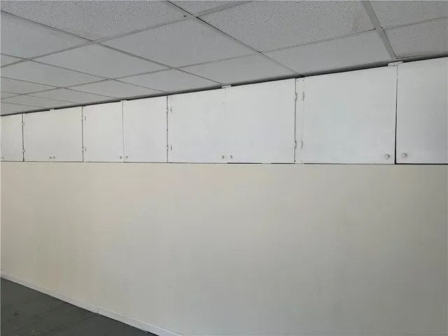 a view of a house with a street