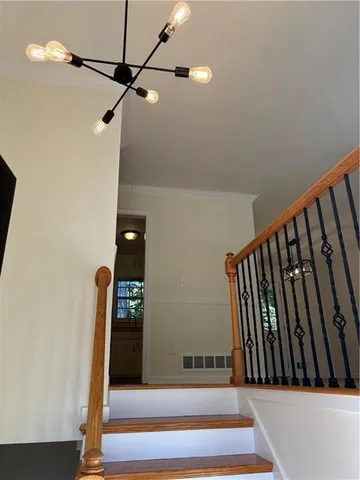 a view of entryway with wooden floor