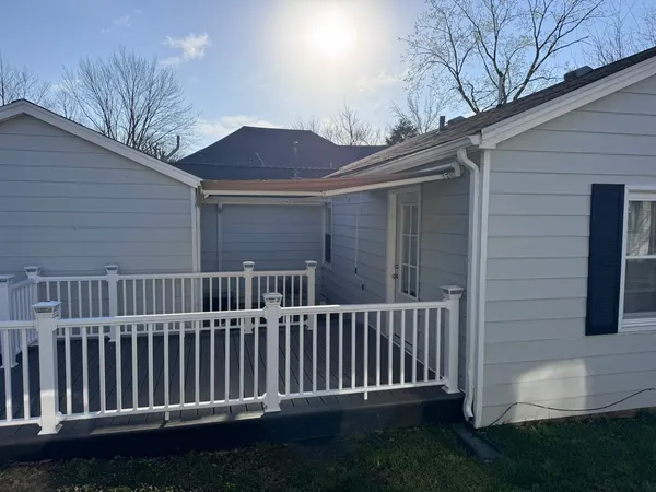 a view of a wooden fence