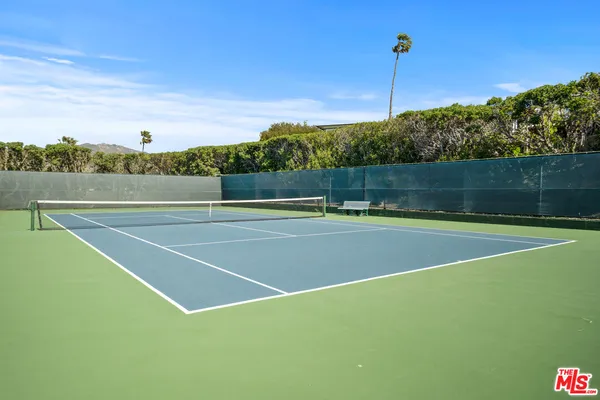 a view of a balcony with an ocean view