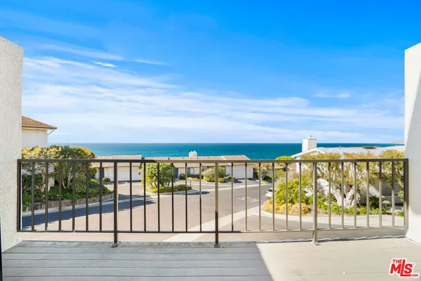 a view of balcony with city view