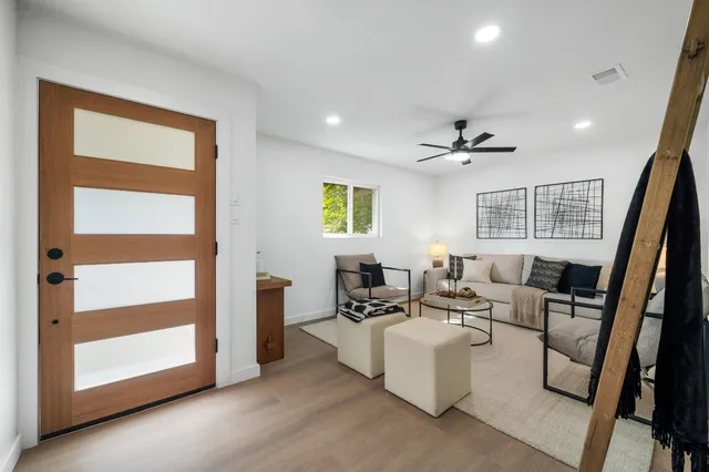 a front view of a house with garden