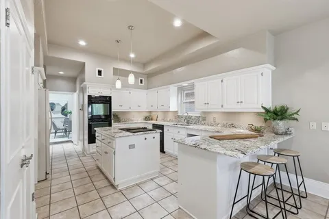 a bathroom with a toilet a sink and a mirror