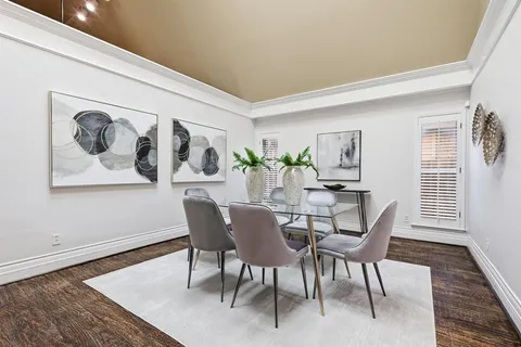 a spacious bedroom with a bed and a fireplace