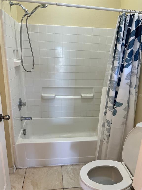 9122 Moonlit Meadows Loop, Unit 1 Riverview, FL 33578 - Photo 11 of 13 a bathroom with a sink and a mirror