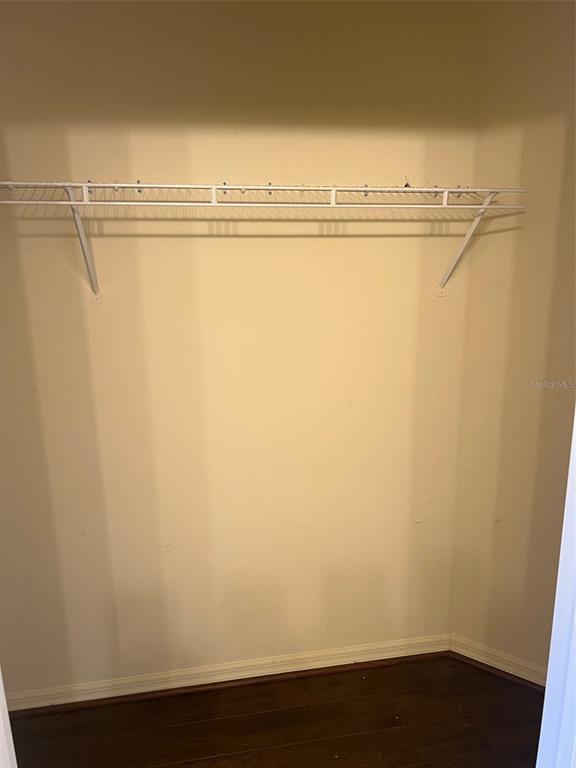 9122 Moonlit Meadows Loop, Unit 1 Riverview, FL 33578 - Photo 12 of 13 a view of a room with wooden floor