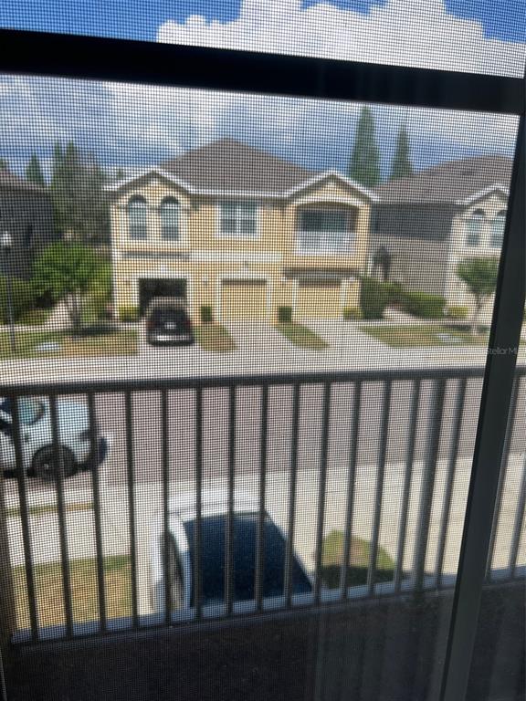 9122 Moonlit Meadows Loop, Unit 1 Riverview, FL 33578 - Photo 13 of 13 a front view of a house with a yard