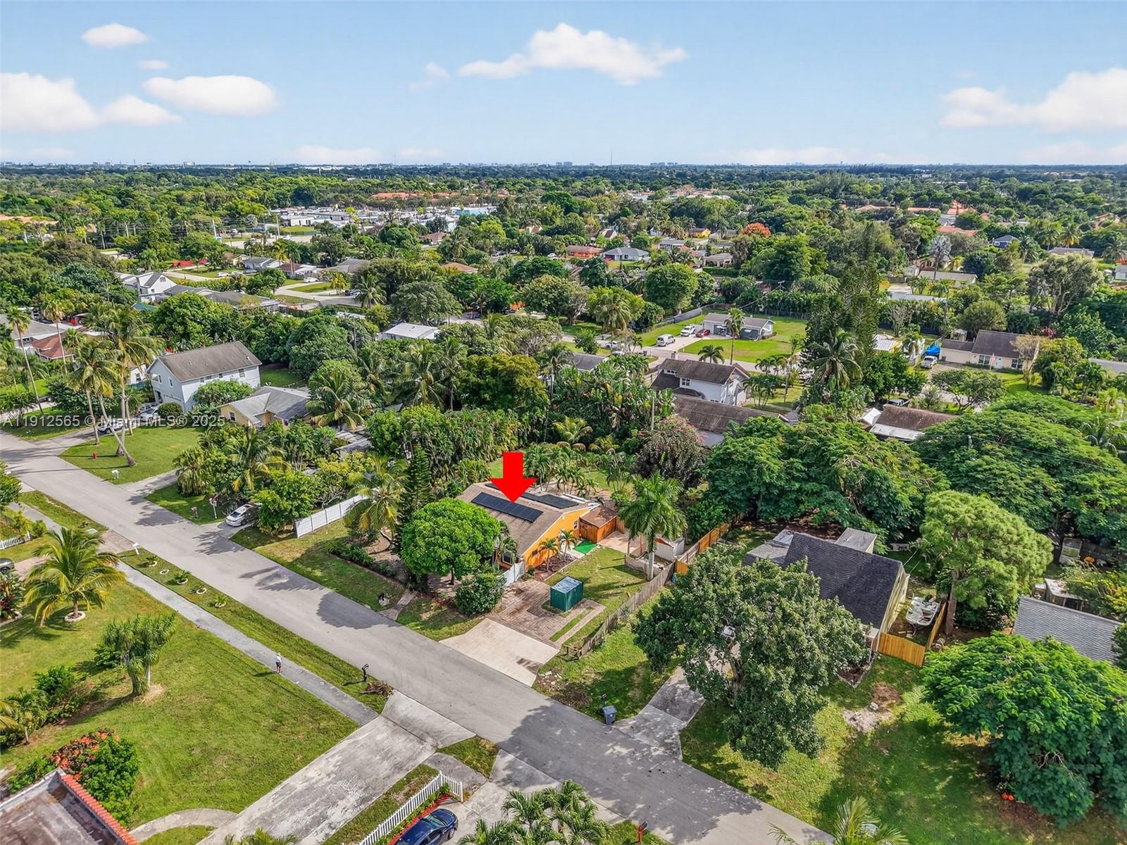 5172 Pine Tree Drive Delray Beach, FL 33484 - Photo 40 of 59 an aerial view of residential houses with outdoor space and trees
