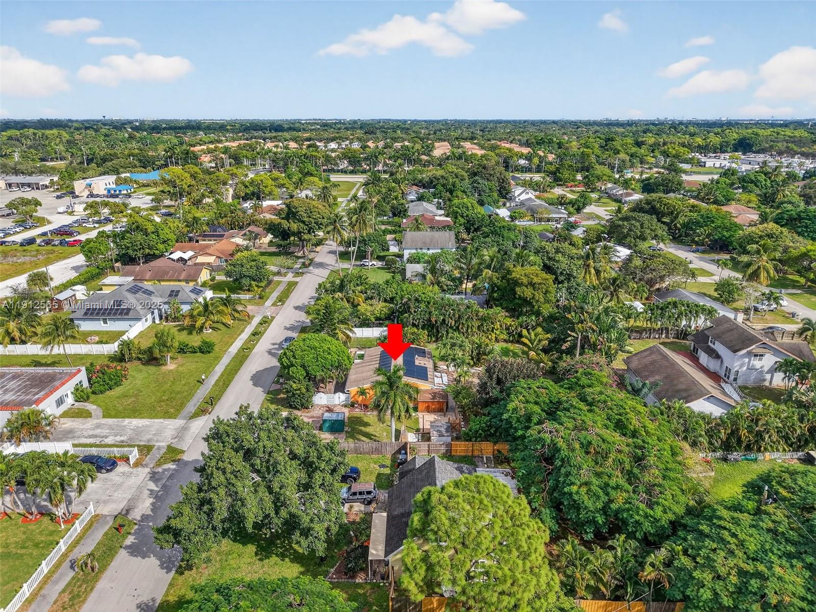 5172 Pine Tree Drive Delray Beach, FL 33484 - Photo 41 of 59 an aerial view of residential houses with outdoor space and trees