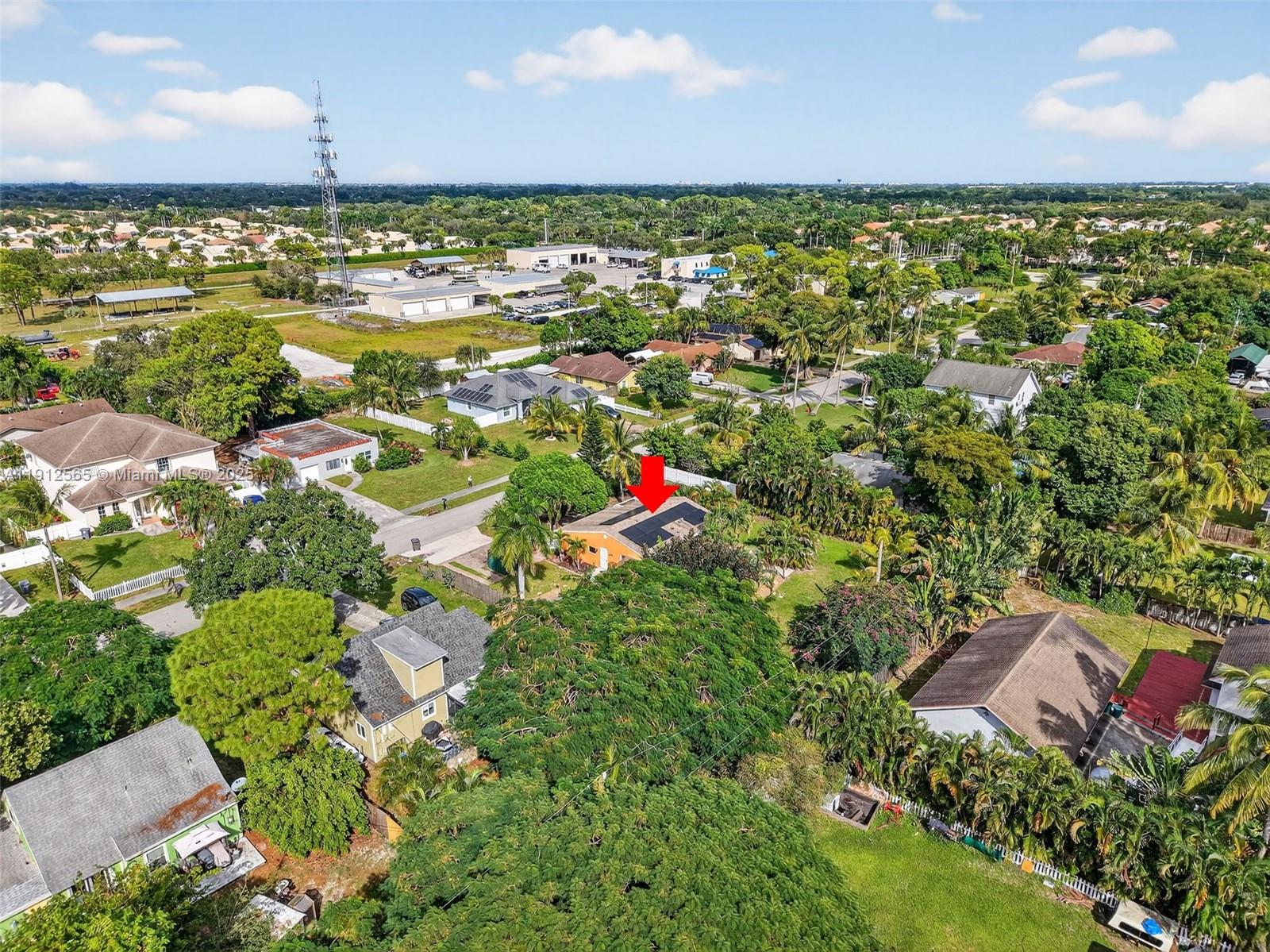 5172 Pine Tree Drive Delray Beach, FL 33484 - Photo 42 of 59 an aerial view of residential houses with outdoor space and trees all around