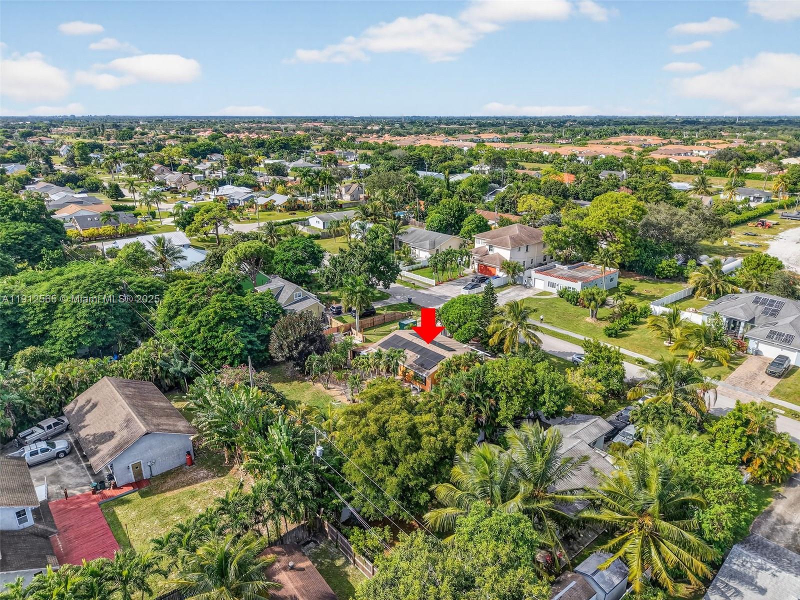 5172 Pine Tree Drive Delray Beach, FL 33484 - Photo 44 of 59 an aerial view of residential houses with outdoor space and trees