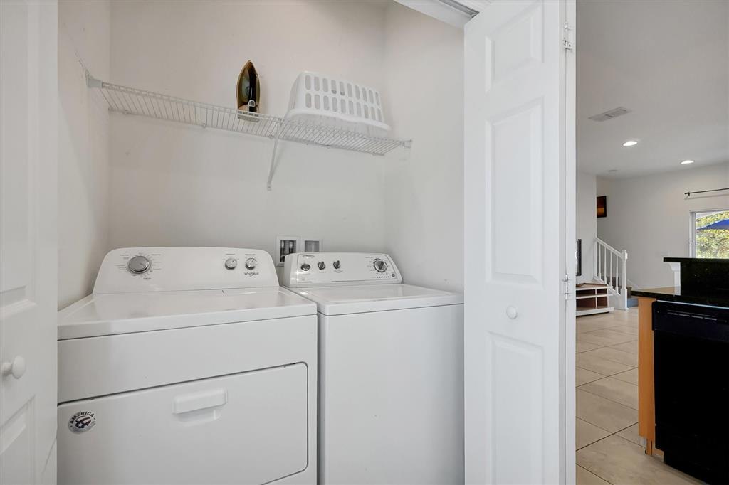 3011 Red Ginger Road Kissimmee, FL 34747 - Photo 34 of 62 a utility room with dryer and washer