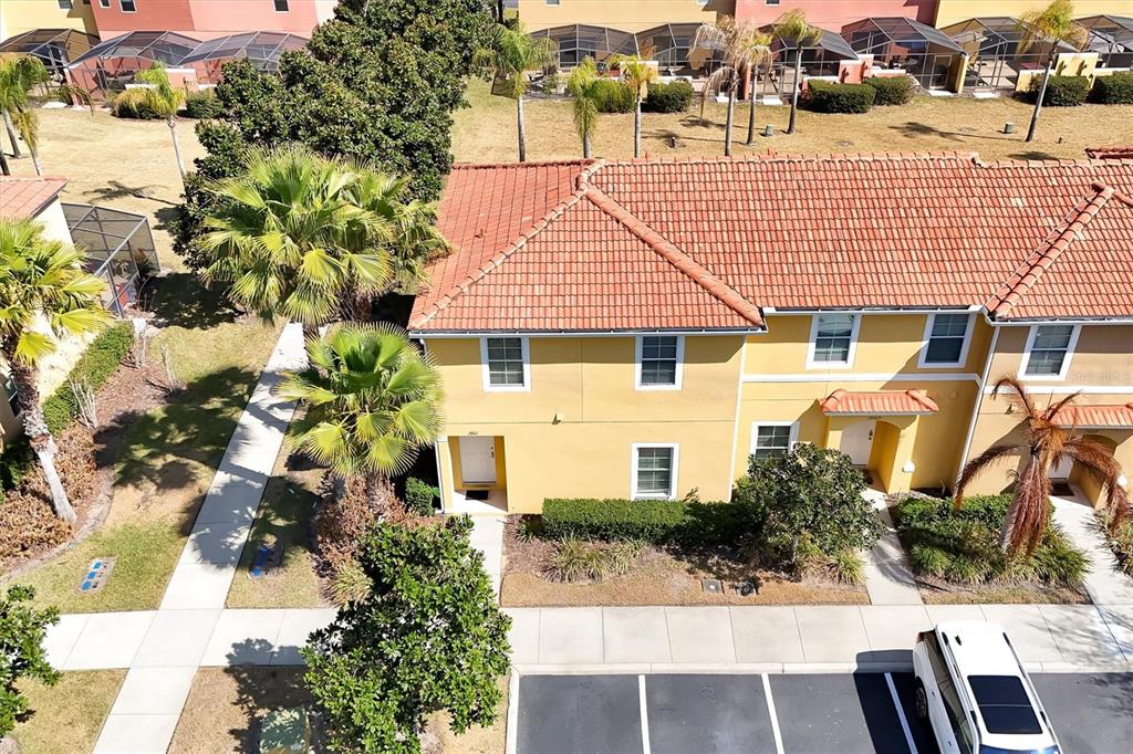 3011 Red Ginger Road Kissimmee, FL 34747 - Photo 37 of 62 an aerial view of a house with a yard