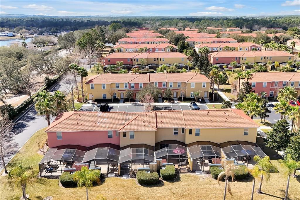 3011 Red Ginger Road Kissimmee, FL 34747 - Photo 40 of 62 an aerial view of a house with yard swimming pool and outdoor seating