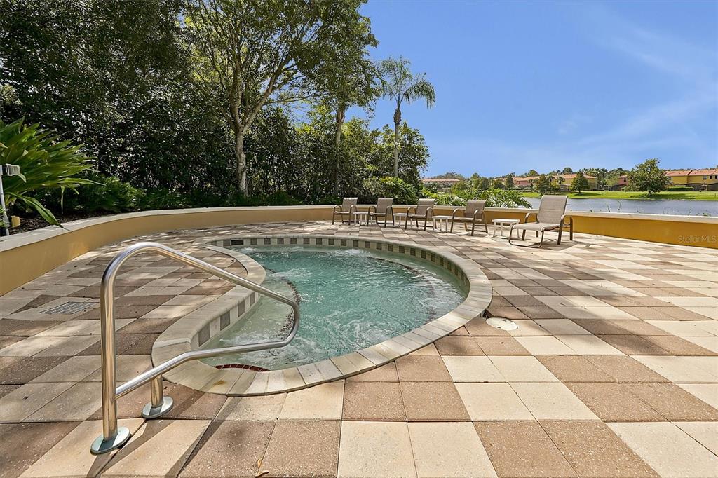 3011 Red Ginger Road Kissimmee, FL 34747 - Photo 47 of 62 a view of a swimming pool with a yard