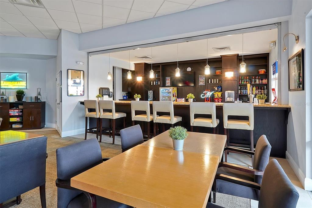 3011 Red Ginger Road Kissimmee, FL 34747 - Photo 54 of 62 a view of a dining room with furniture