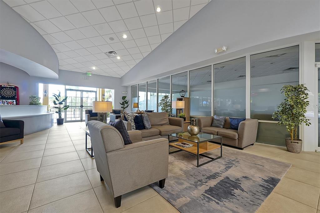 3011 Red Ginger Road Kissimmee, FL 34747 - Photo 57 of 62 a living room with furniture and a large window