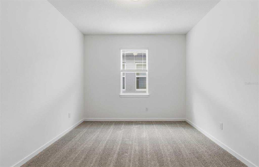 3734 Obsidian Drive Spring Hill, FL 34609 - Photo 14 of 25 an empty room with a window