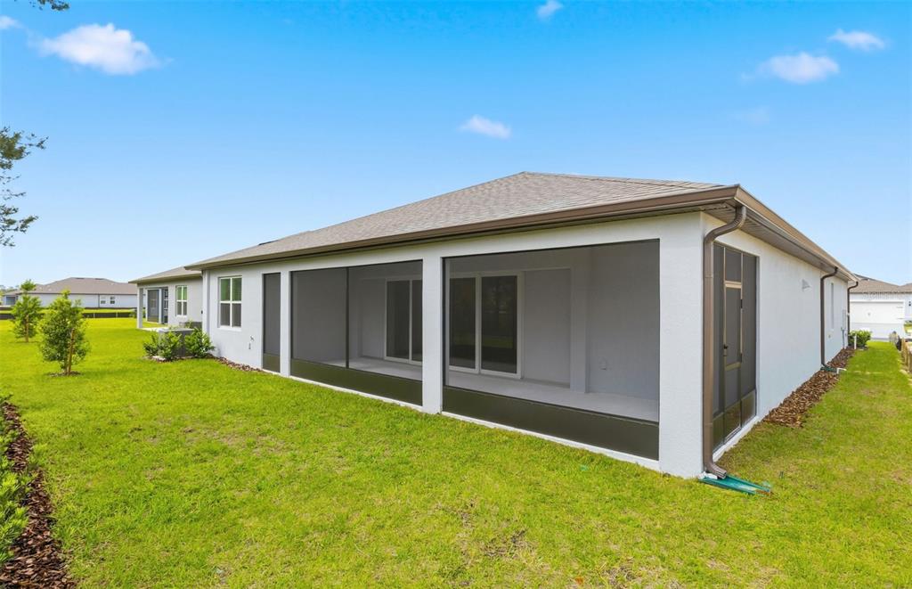 3734 Obsidian Drive Spring Hill, FL 34609 - Photo 19 of 25 a front view of house with yard