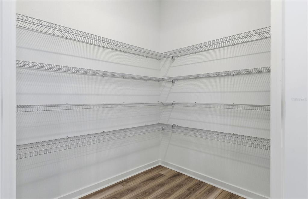 3734 Obsidian Drive Spring Hill, FL 34609 - Photo 5 of 25 a view of a room with shelf