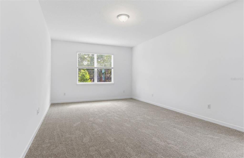3734 Obsidian Drive Spring Hill, FL 34609 - Photo 8 of 25 an empty room with a window