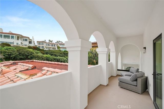a outdoor living space with furniture and garden view