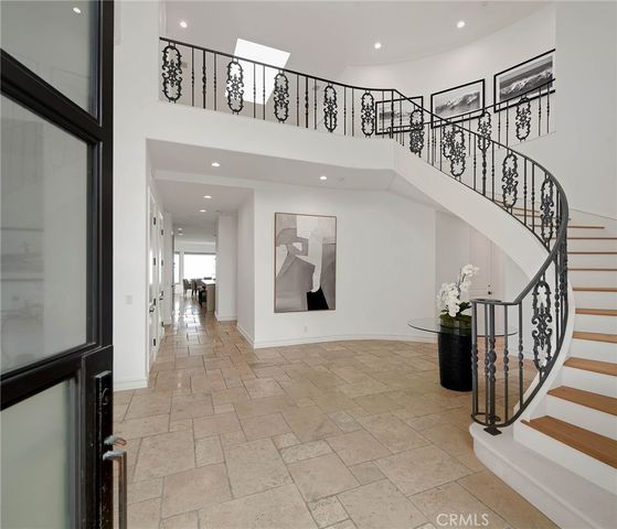 a view of staircase with white walls and stairs