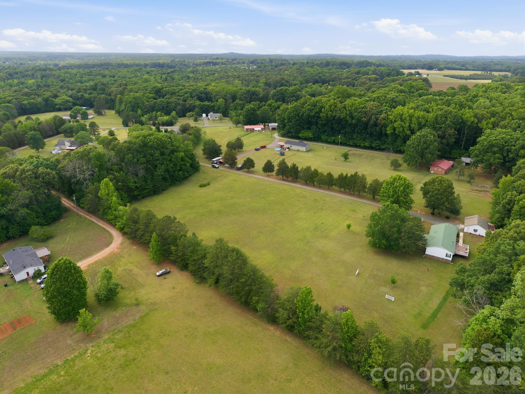 Tbd Sisk-Carter Road Rockwell, NC 28138 - Photo 4 of 14 an aerial view of a houses with outdoor space and street view