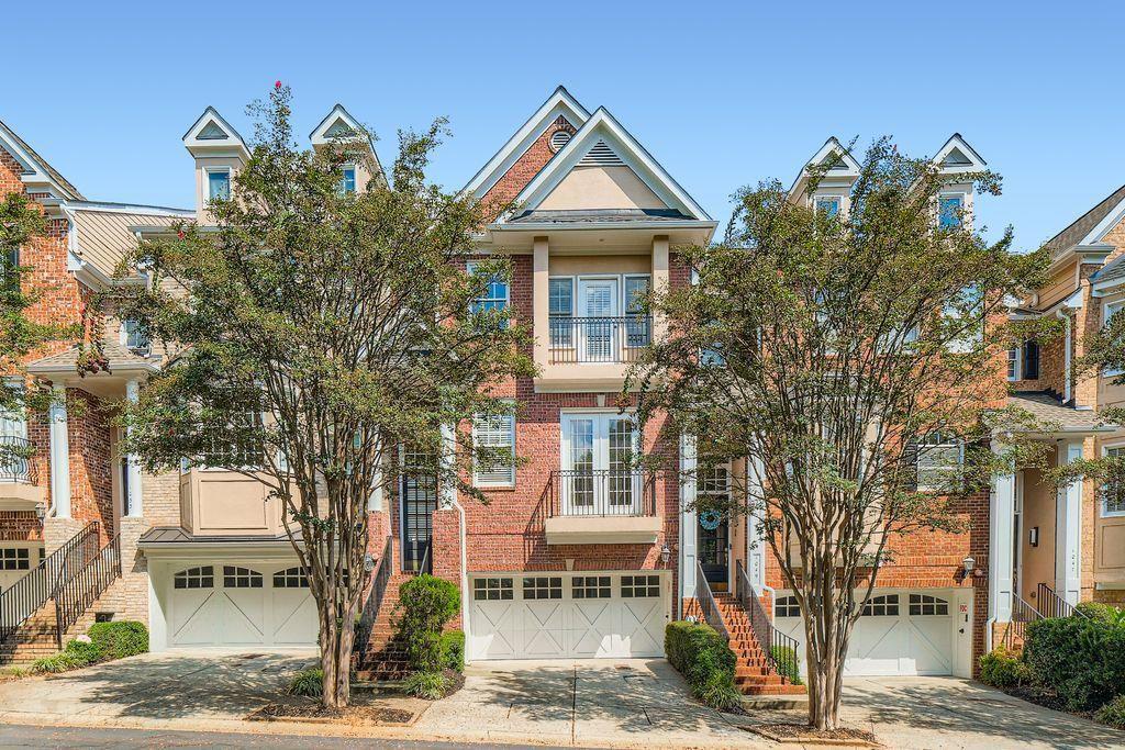 1051 Emory Parc Place Decatur, GA 30033 - Photo 1 of 30 a front view of a house with garden