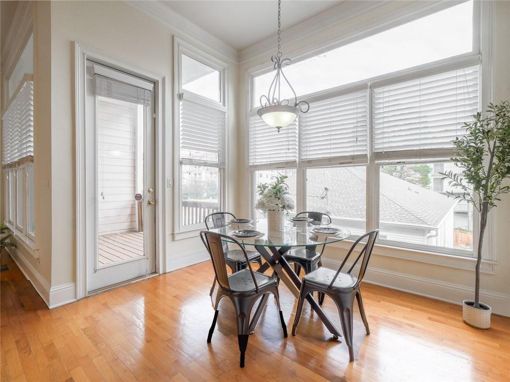 1051 Emory Parc Place Decatur, GA 30033 - Photo 7 of 30 a view of a dining room with furniture window and wooden floor