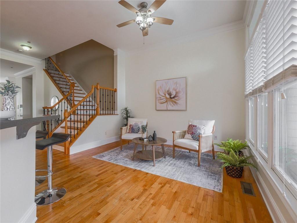 1051 Emory Parc Place Decatur, GA 30033 - Photo 9 of 30 a living room with furniture and wooden floor