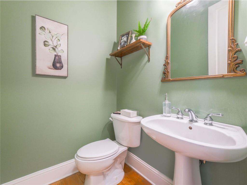 1051 Emory Parc Place Decatur, GA 30033 - Photo 10 of 30 a bathroom with a sink mirror and toilet