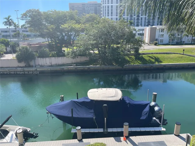 a view of a chairs and table in patio