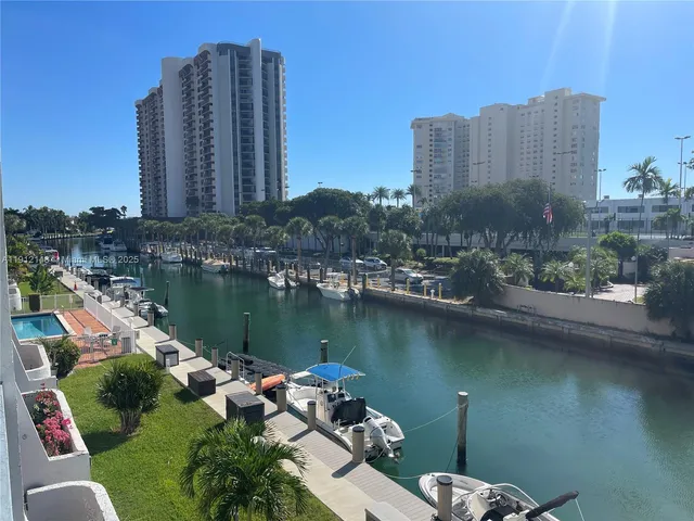 a view of a city with tall buildings