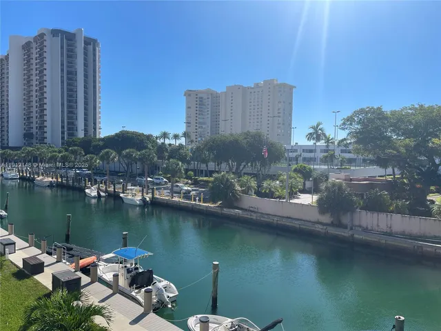 a view of a city with a lake