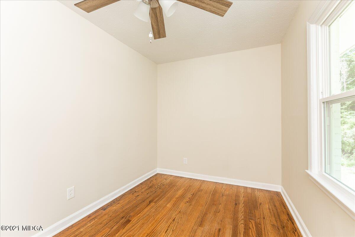 5611 Sardis Church Road Macon, GA 31216 - Photo 11 of 32 a view of small space with wooden floor and windows